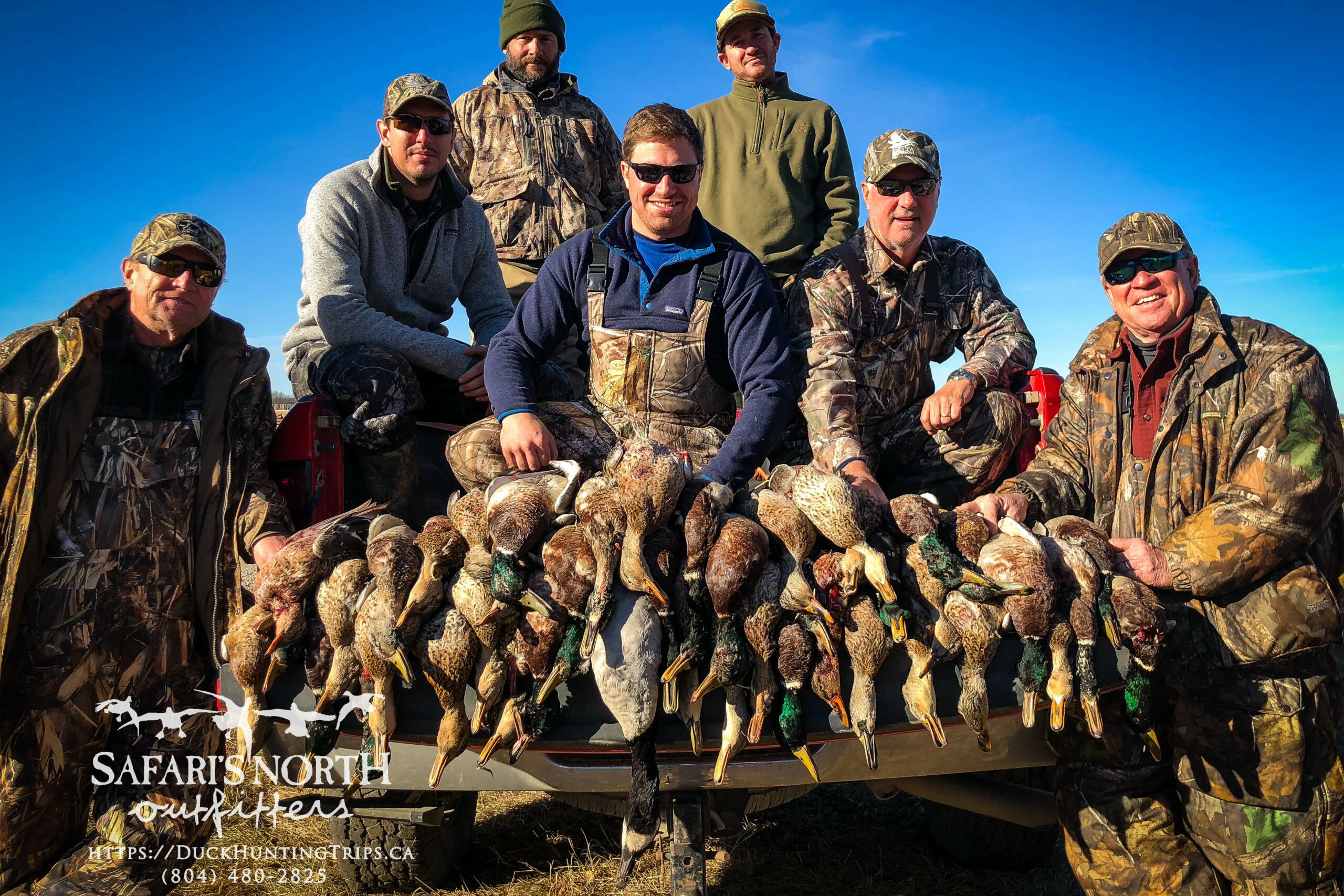 Successful waterfowl hunters with diverse bag