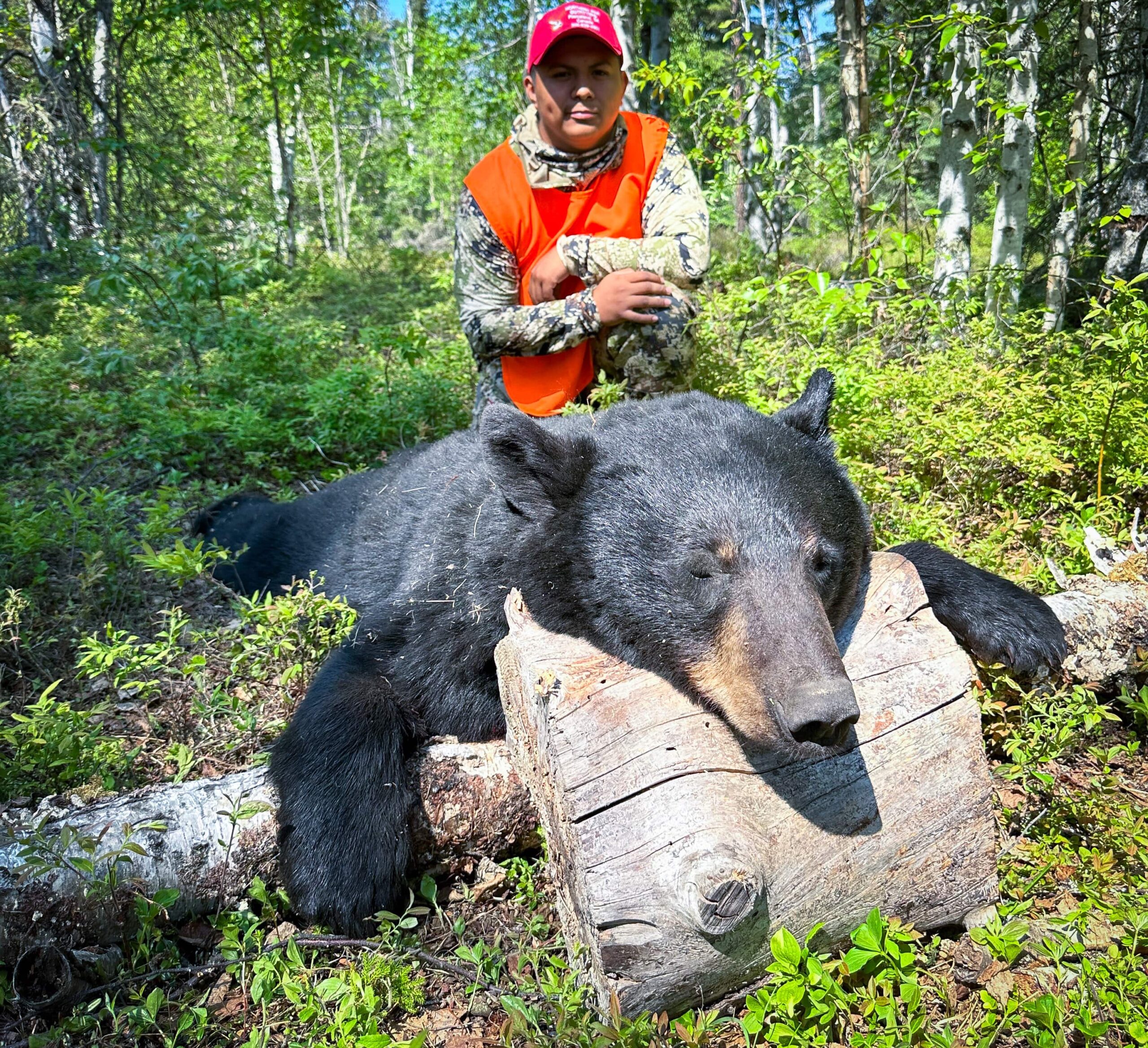 Successful hunter with Saskatchewan black bear trophy