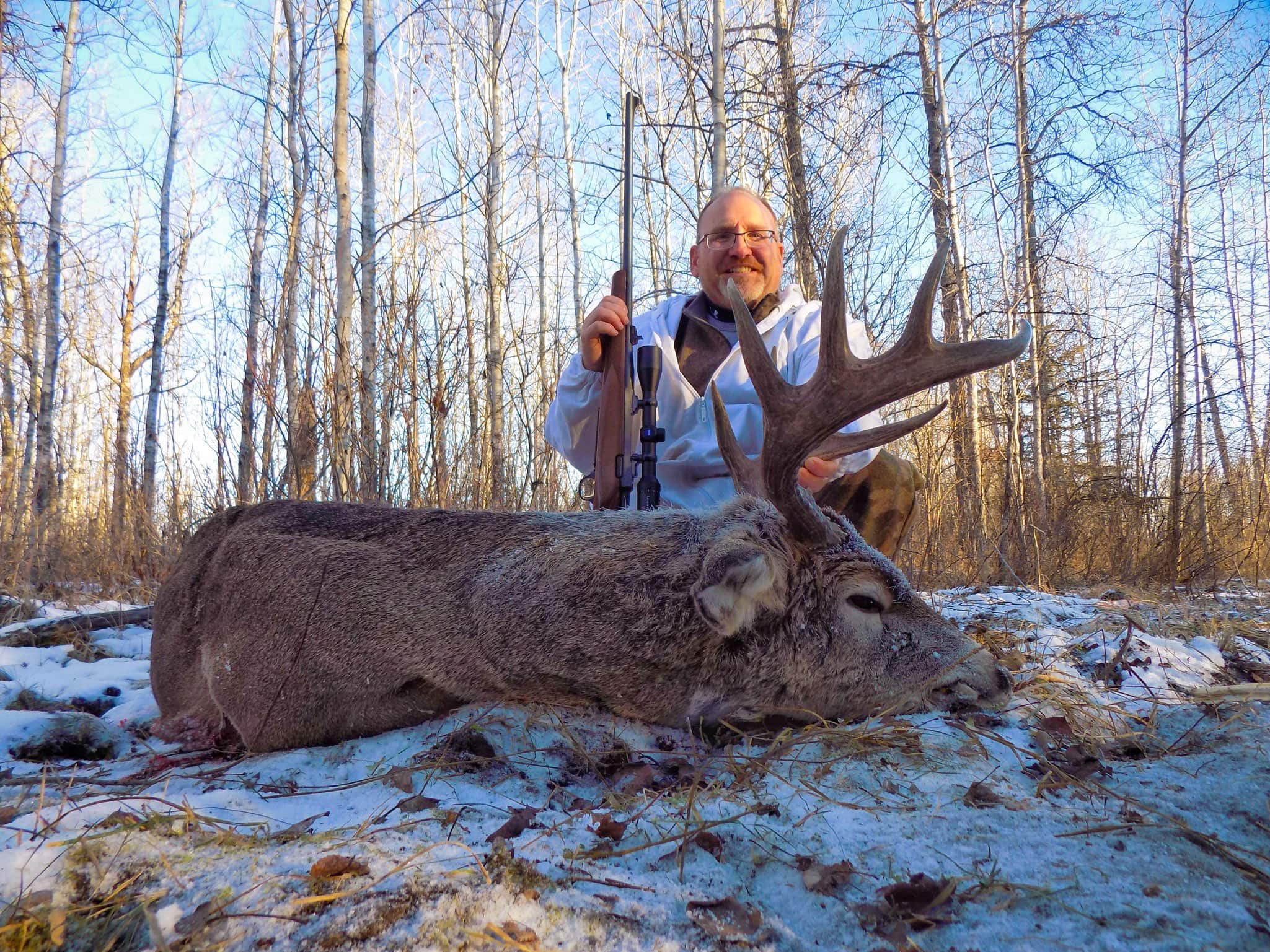 Successful hunter with Saskatchewan trophy whitetail